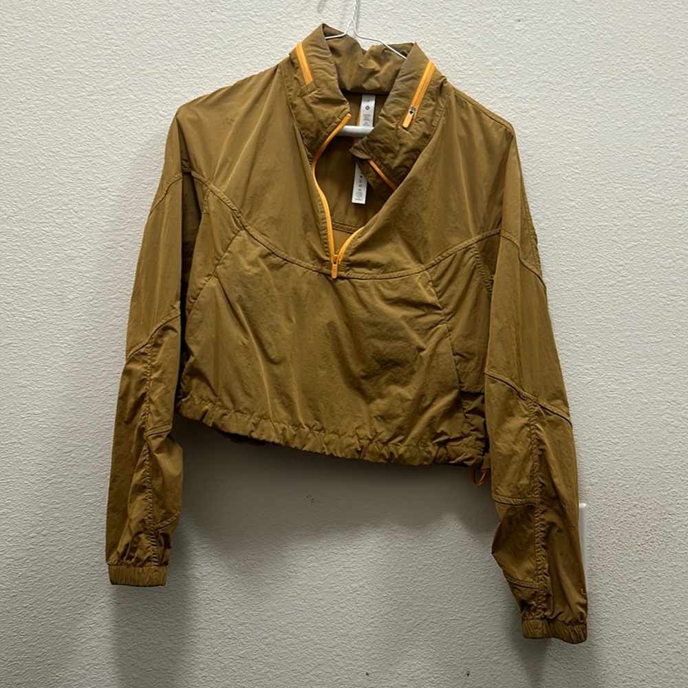 Lululemon jacket; light weight: with hoodie foldable. Size 4